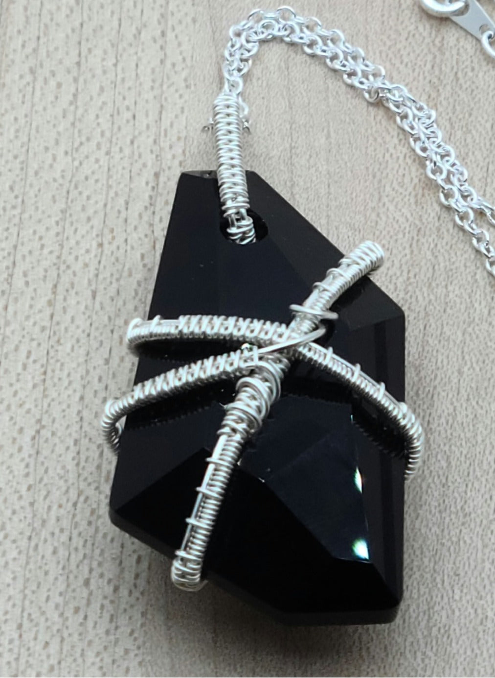 Woven Wire Caged Black Crystal Pendant