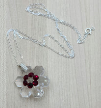 crystal snowflake pendant with deep red crystal decoration