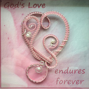 woven wire Rose Pink Heart Shadow Box reads "God's Love endures forever"