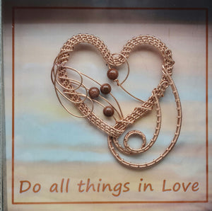 Woven Wire Copper Heart Shadow Box reads Do all things in Love