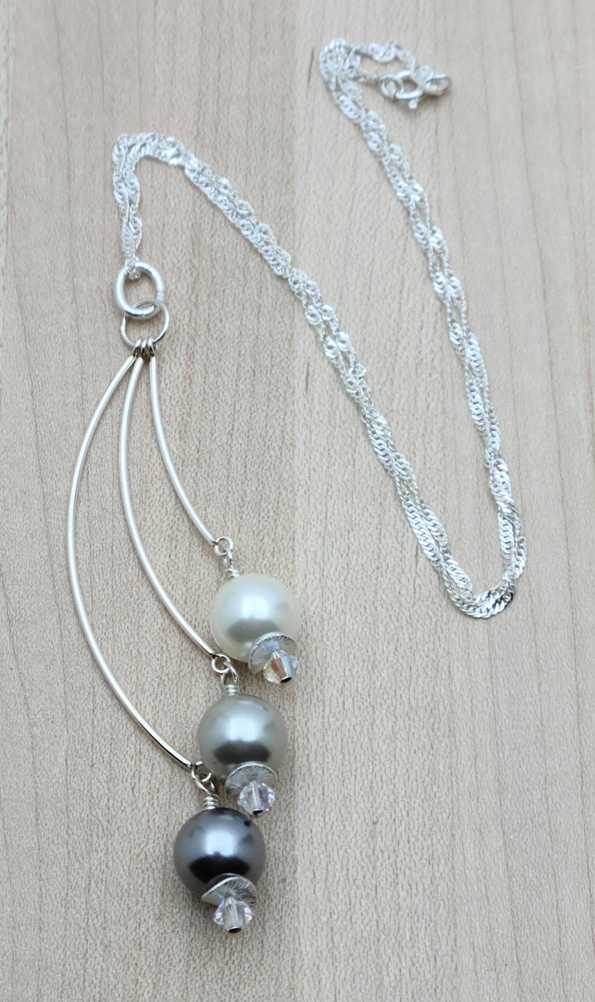 Indulge in the luxurious elegance of my White, Silver &amp; Grey Shell Pearl Necklace.