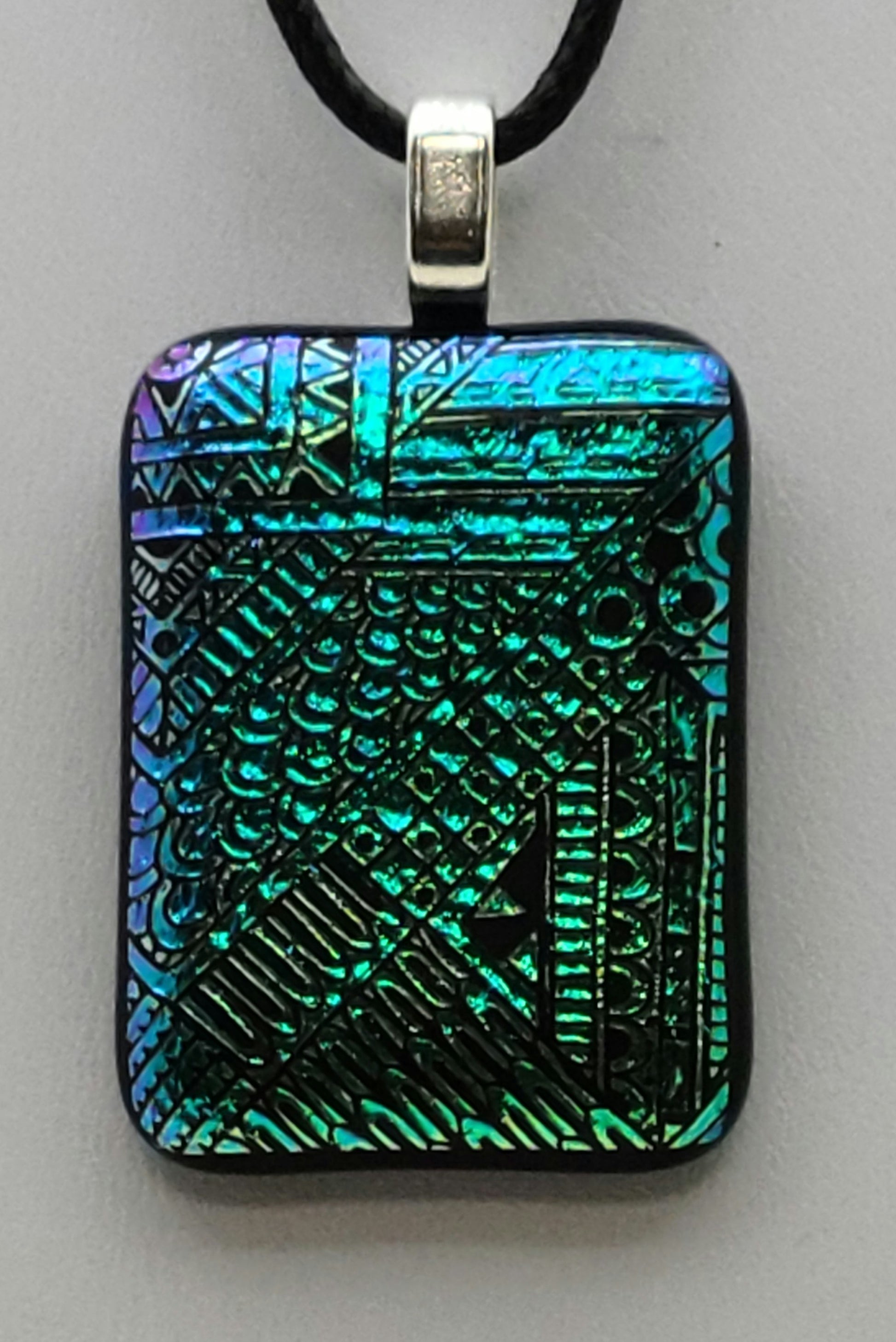 linear geometric designs in teal crinkle dichroic fused glass pendant