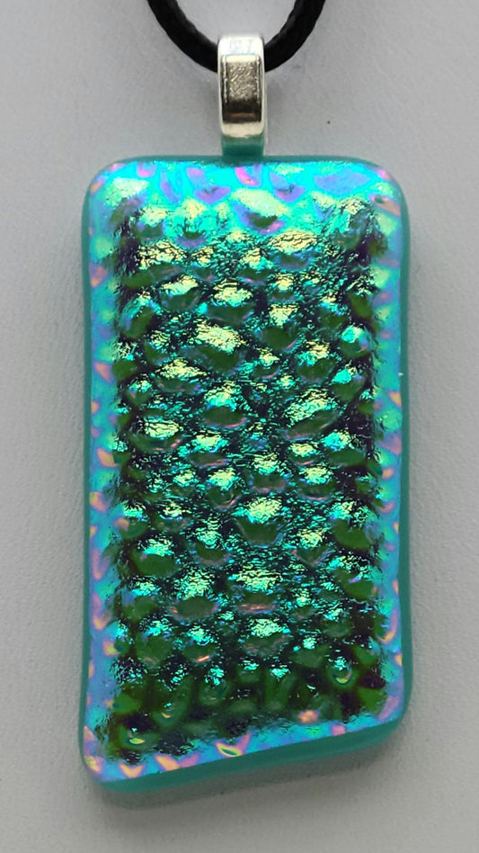 Lovely, textured dichroic fused glass pendant in shiny aqua.