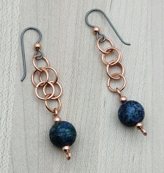 deep blue chrysocolla beads look great on interlocking copper rings. hypoallergenic french hook ear wires