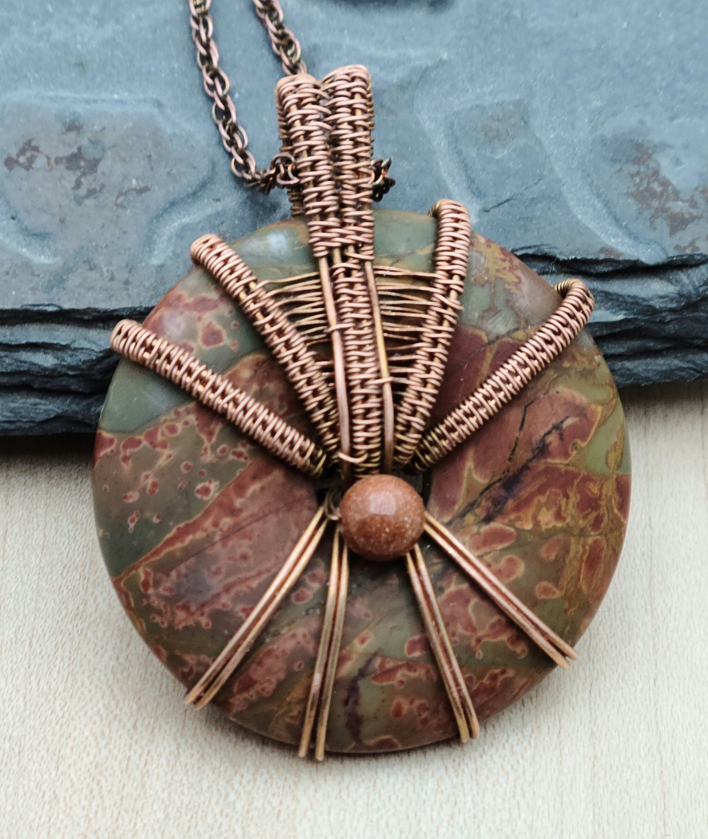 Copper Woven Wire Red Creek Jasper Donut Pendant