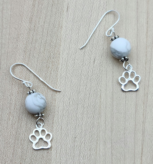 cute sterling silver pet paws dangle from grey & white howlite, which hangs from sterling silver fish hook ear wires to shows your love for you pet