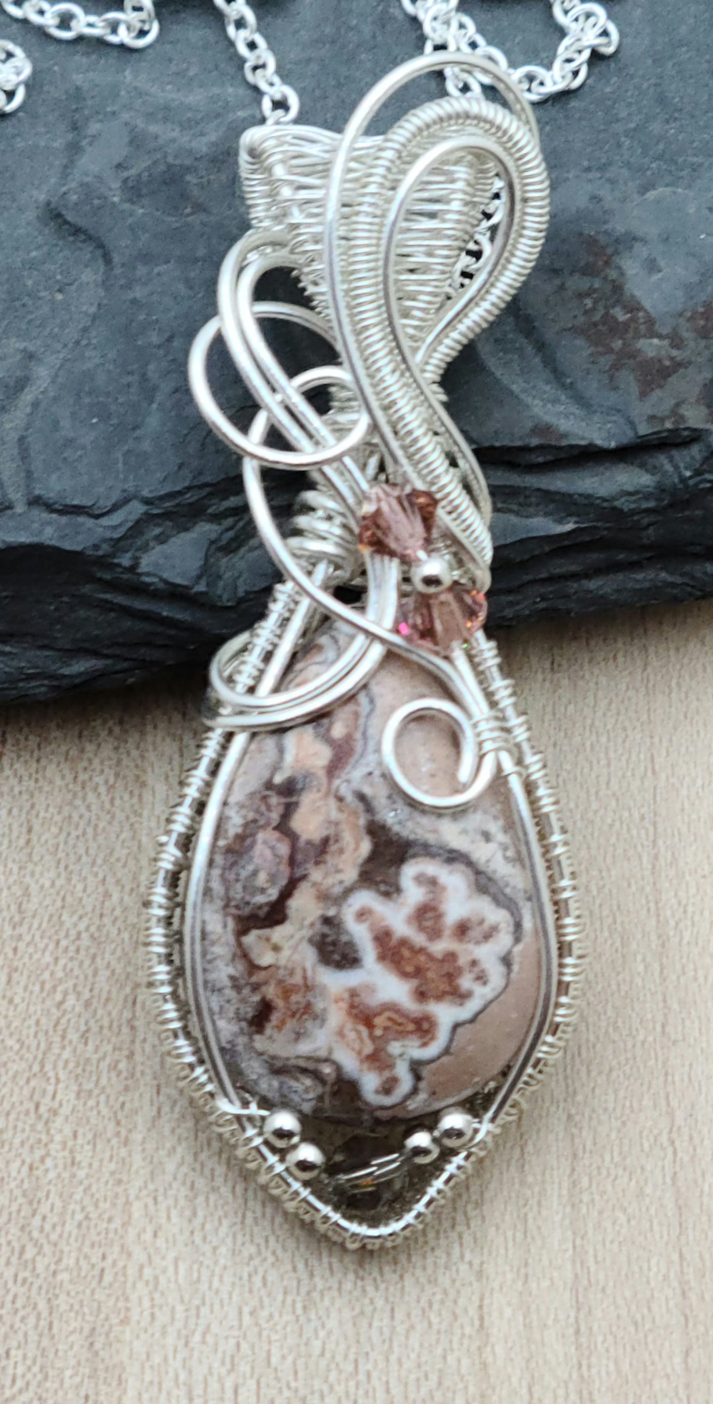 Introducing your new favorite conversation starter—this gorgeous rosita jasper & crystal woven wire pendant!