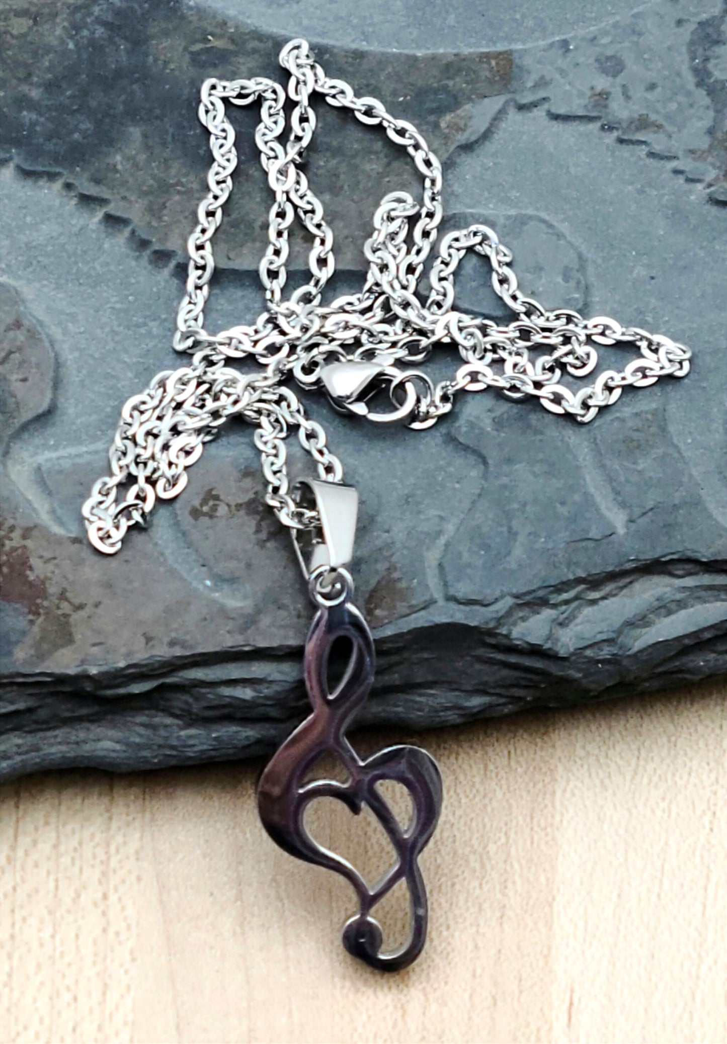 Stainless Steel Treble Clef with Heart  design inclusion Necklace