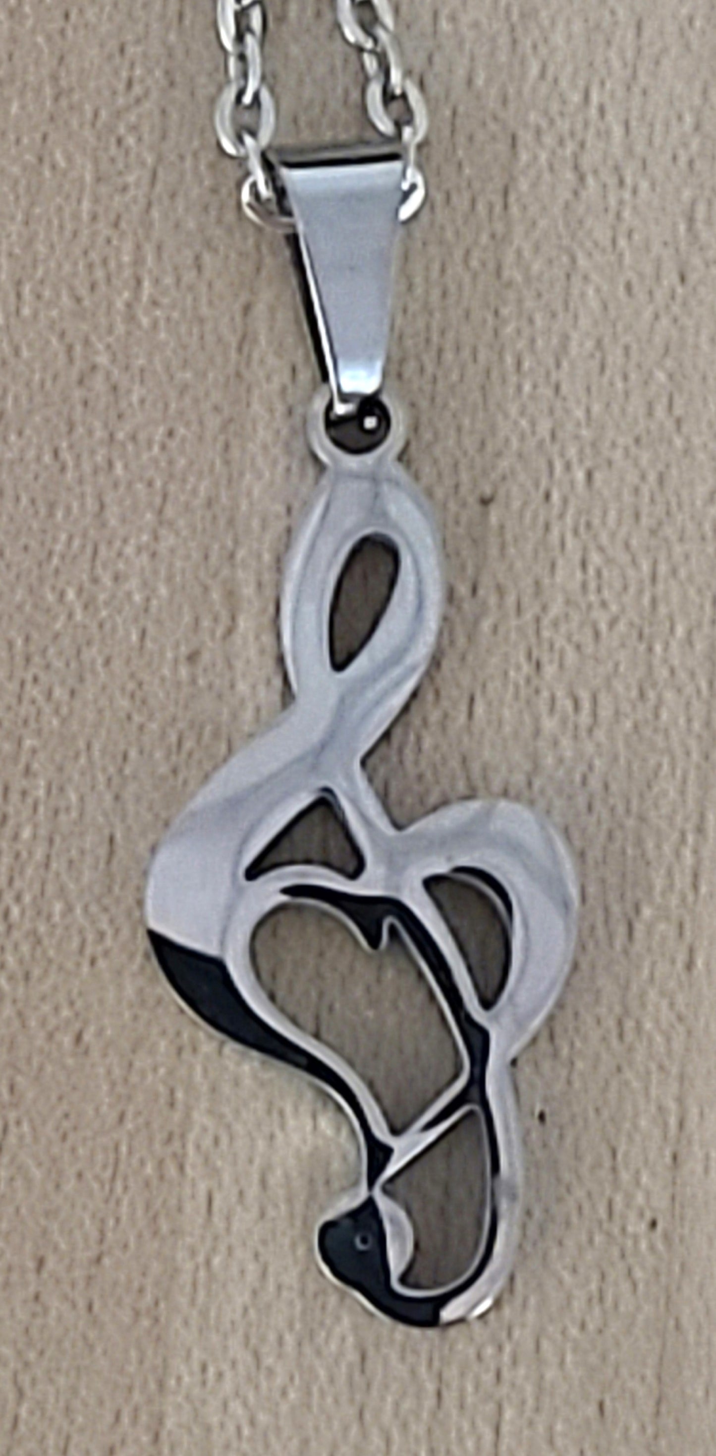 Stainless Steel Treble Clef with Heart  design inclusion Necklace