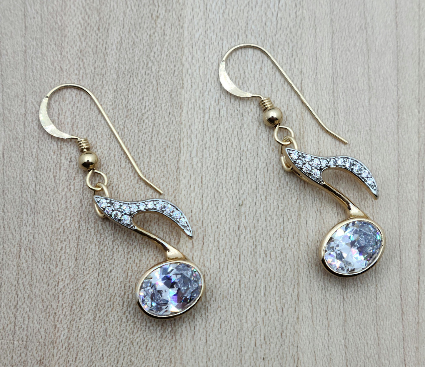 Musicians & music lovers will want this 
these CZ enhanced 8th note earrings! 