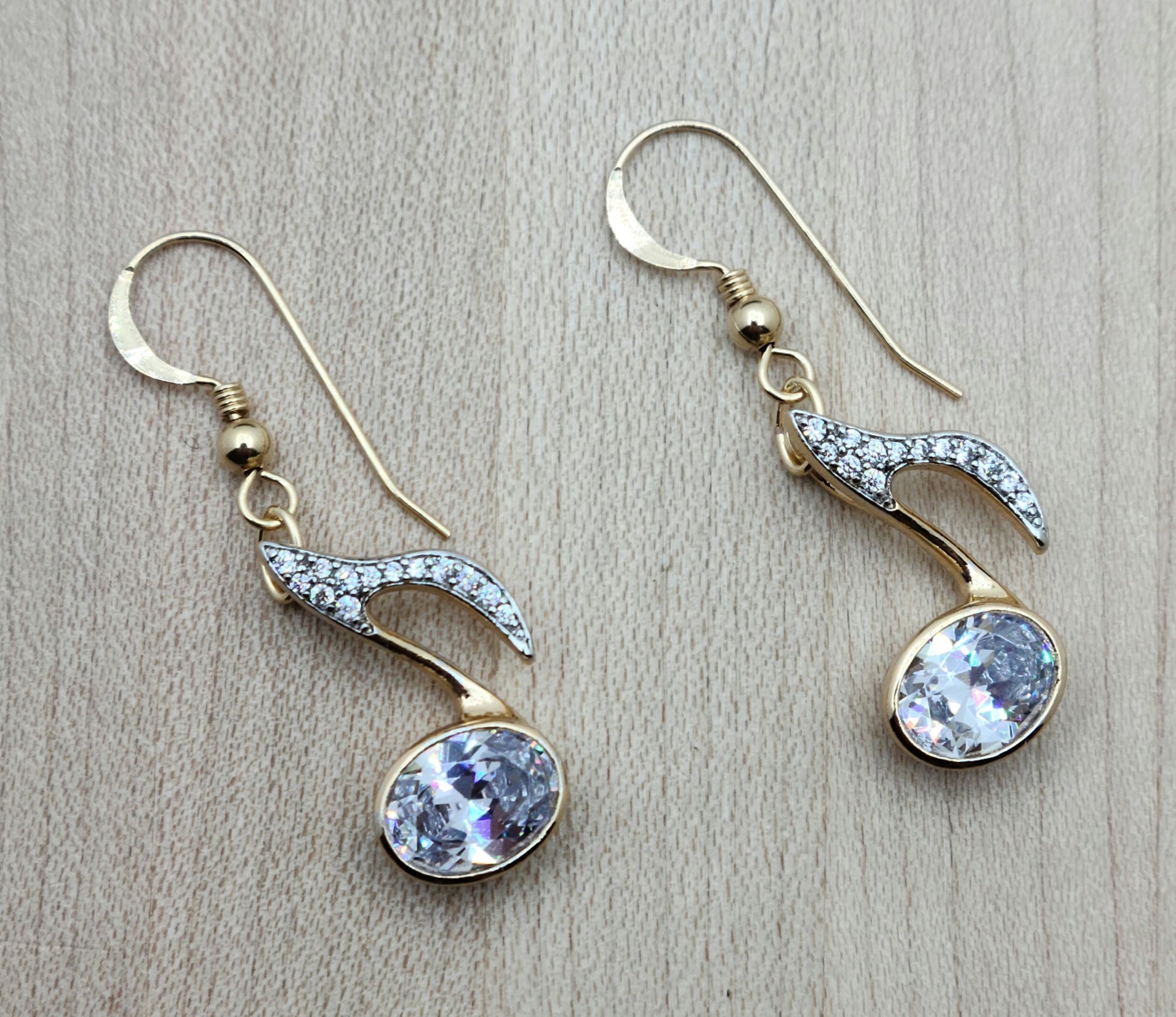 Musicians & music lovers will want this 
these CZ enhanced 8th note earrings! 