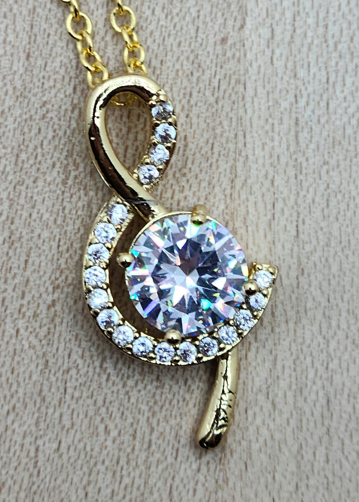 Musicians & music lovers will want this CZ enhanced treble clef necklace!