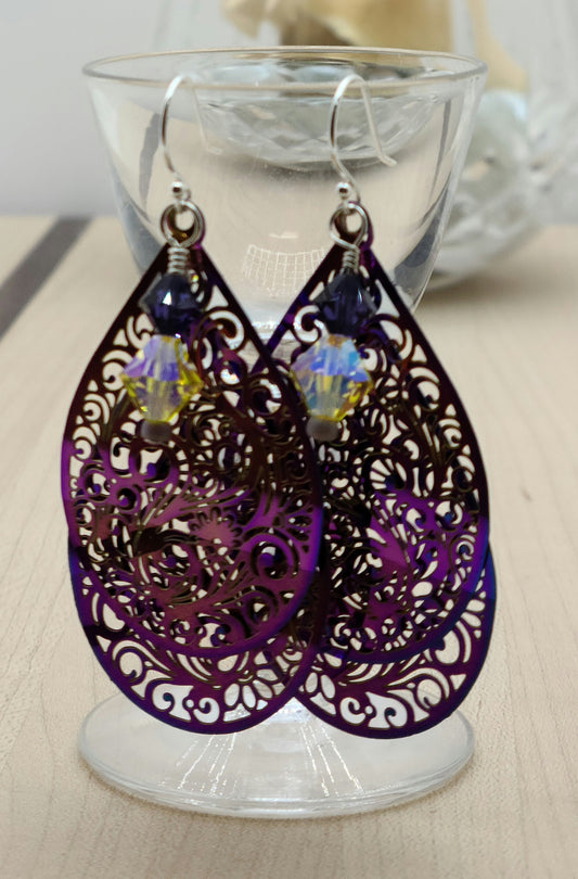 These incredibly lightweight electroplated yellow & purple stainless steel teardrops have been laser cut with a swirling and intricate design. I added crystal* ornaments for a 'bling' element.