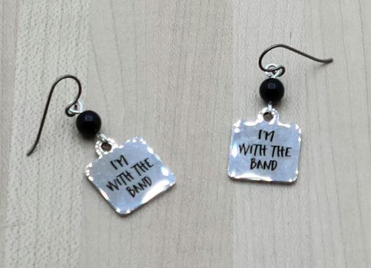 Proudly announce that you are indeed "with the band" by wearing these shiny stainless steel earrings suspended from black crystal pearls.