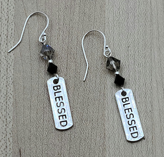Feeling blessed? I certainly do! These pewter earrings stamped with BLESSED and suspended from blingy crystals let folks know how you feel.
2" with sterling silver fish hook earwires