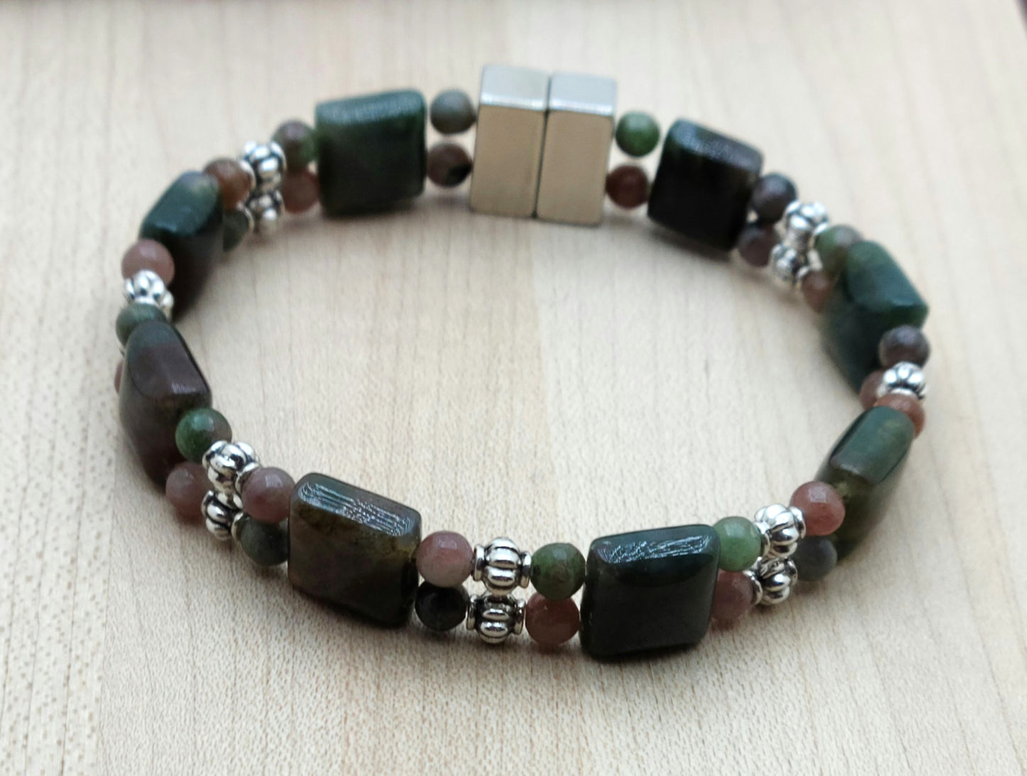If you're a fan of green & all things earthy, this bracelet is for you! The deep green of the moss agate squares finds a great companion in the muted greens &  roses of Kashgar garnet. Bali style silver pewter beads add just enough brightness.
Neodymium magnetic clasp - these are awesome . . . & VERY strong!