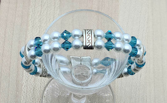 Soft & SO pretty define this double row bracelet of pale moonlight crystal pearls & light teal crystals. The fancy dividers are lead & nickel free alloy.
Neodymium magnetic clasp - these are awesome . . . & VERY strong!
