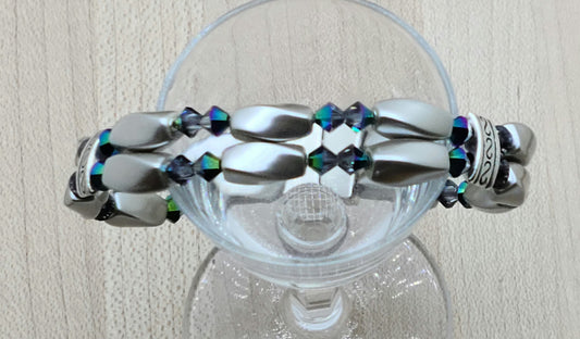 The metallic, almost iridescent greens, blues, & purples of the scarab beetle come to life in the fascinating crystals of the magnetic hematite bracelet. The fancy dividers are lead & nickel free alloy.
Neodymium magnetic clasp - these are awesome . . . & VERY strong!