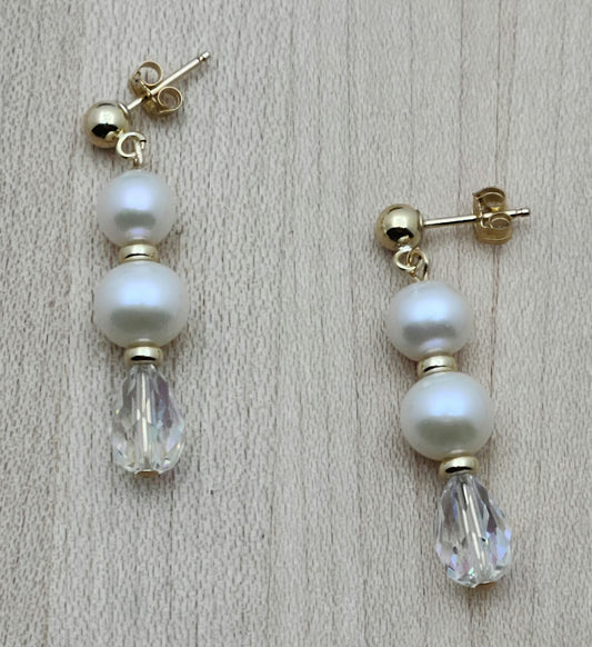 Freshwater pearls are SO classy. You'll love the movement & sparkle of this pair that joins pearls, gold fill , aur 1 3/8" with gold ball post earrings