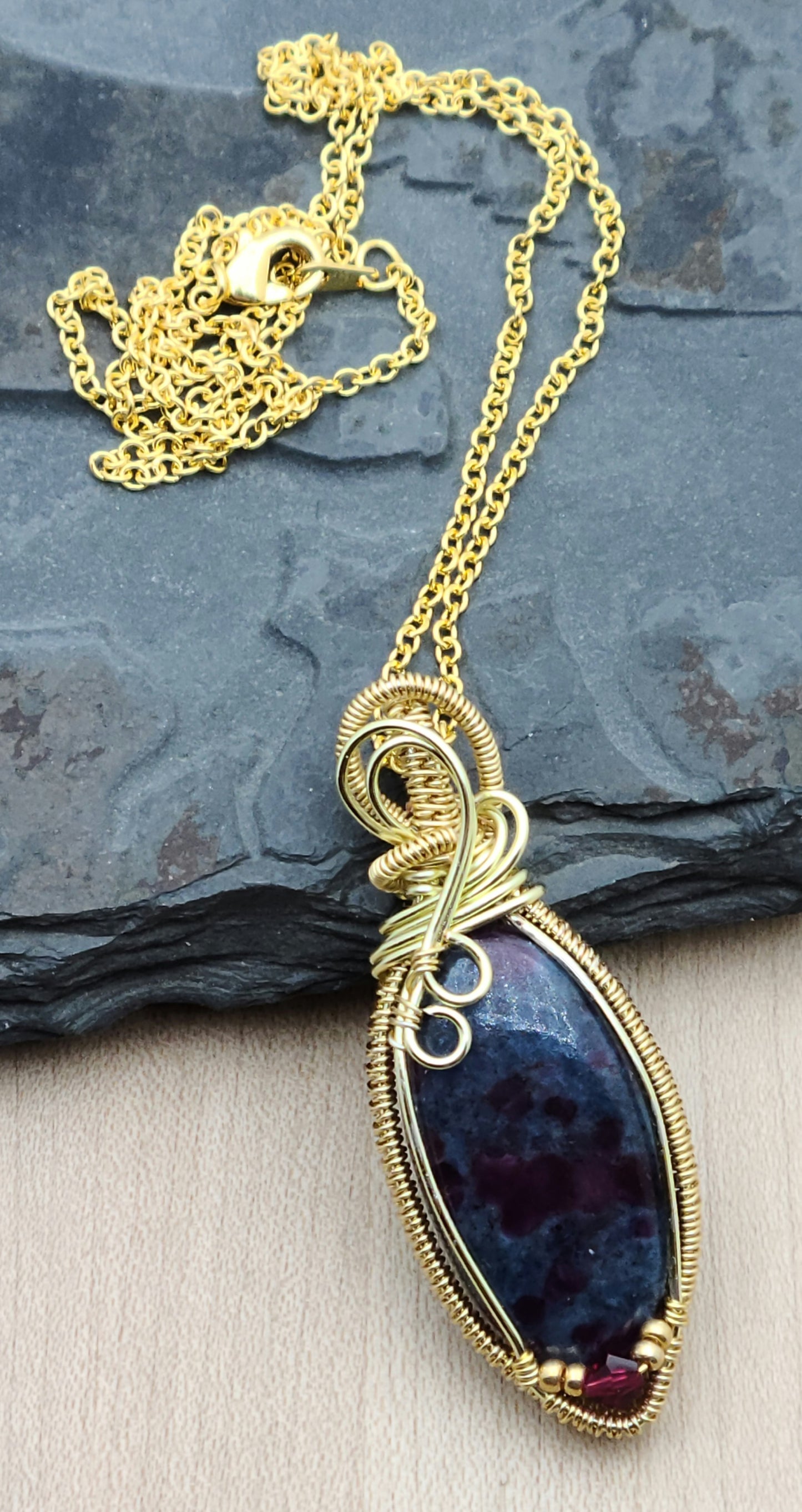 Gold Woven Wire Framed Ruby in Apatite Pendant