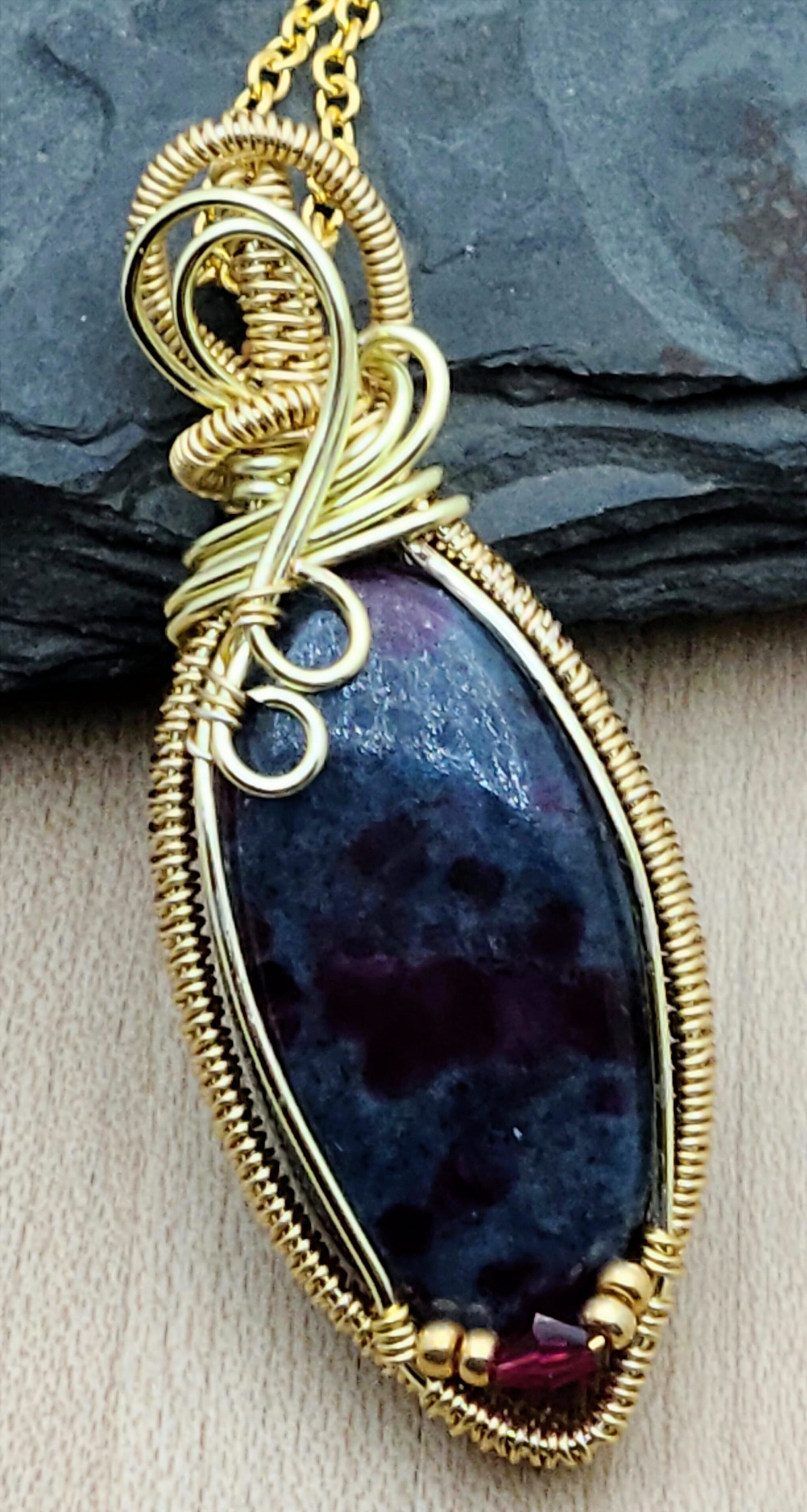 Gold Woven Wire Framed Ruby in Apatite Pendant