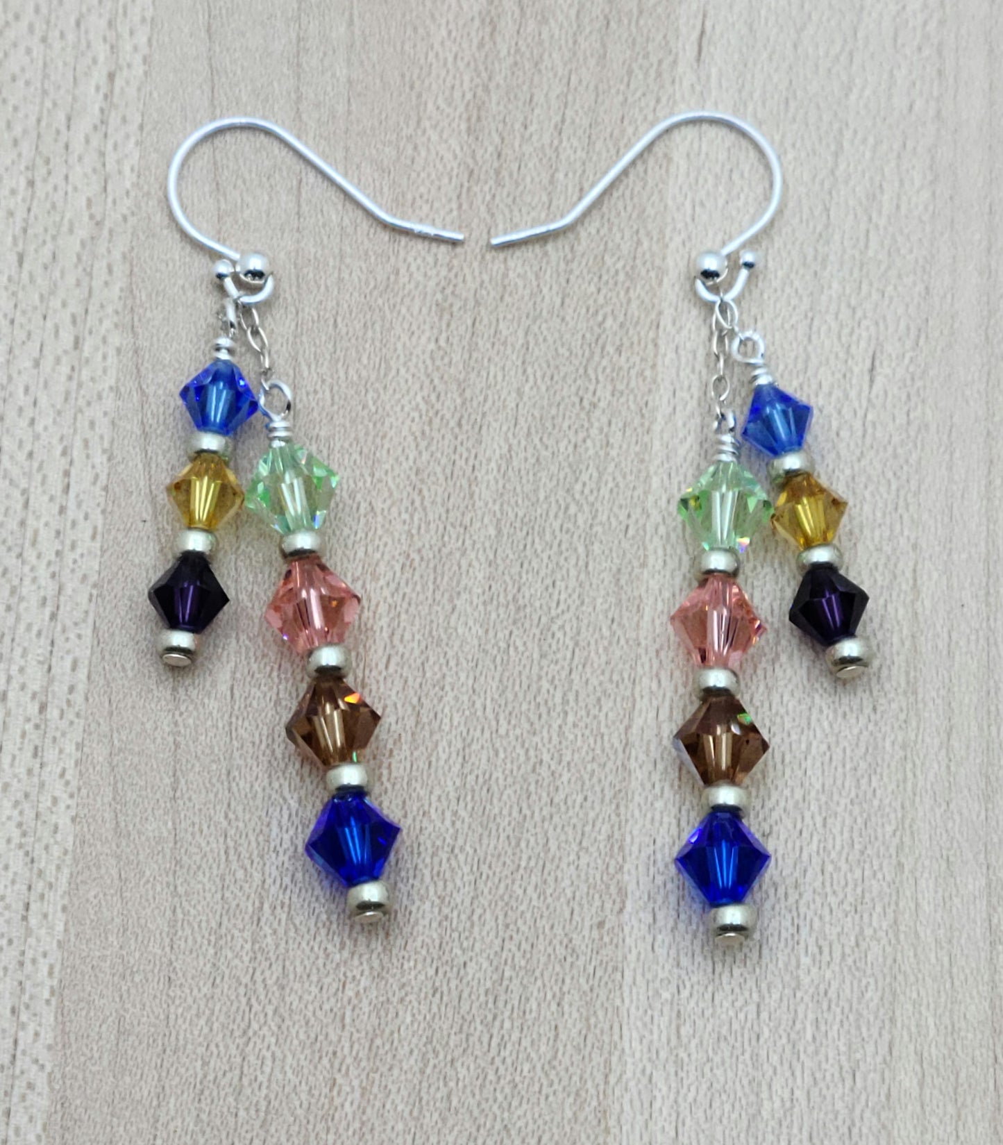 dangle crystal earrings in chakra colors