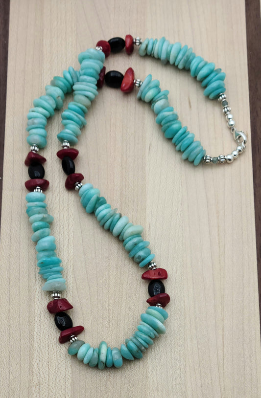 Bright colors, chunky stones! Nuggets of amazonite & coral swing with black onyx & pewter beads for a wonderful, bold look in a necklace.