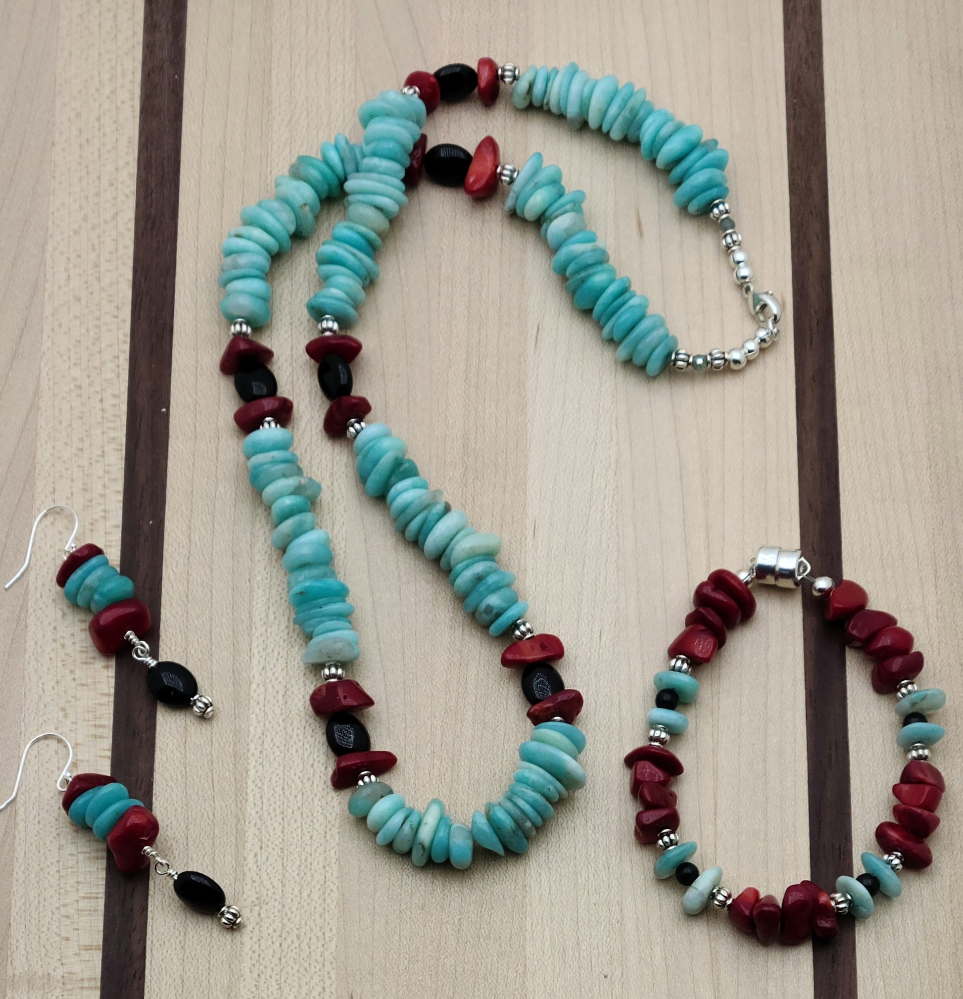 Bright colors, chunky stones! Nuggets of amazonite &amp; coral swing with black onyx & pewter beads for a wonderful, bold look in a necklace, bracelet, & earrings.