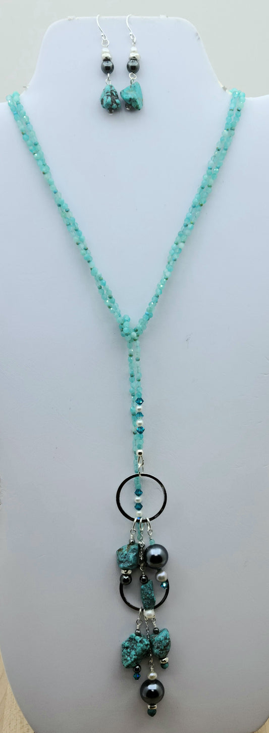 Lariat style necklace of shell pearls, fw pearls, hematite, crystals, turquoise, & amazonite. Turquoise nugget earrings.