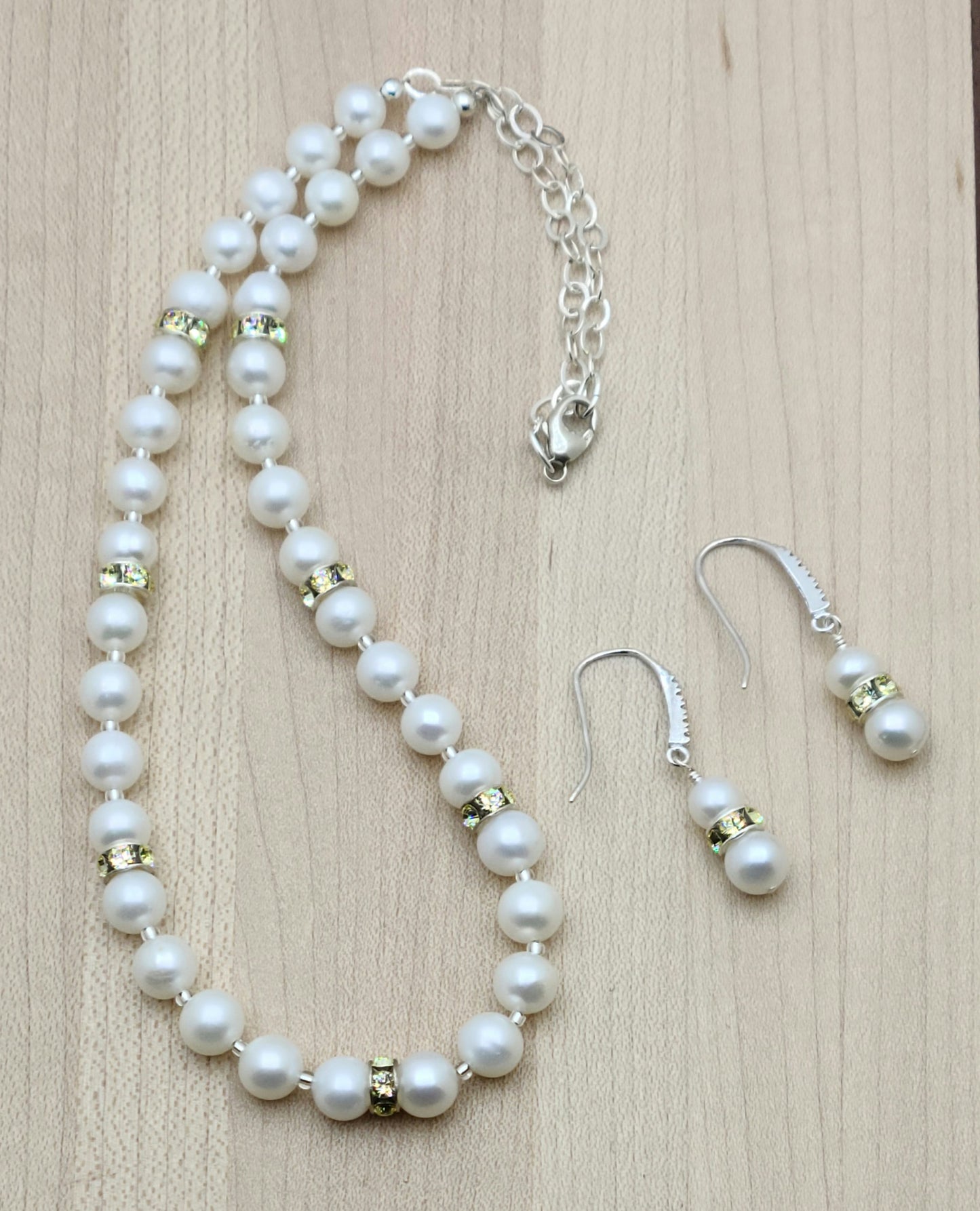 These days, pearls are worn with EVERYTHING and I love that! These lovely near-round freshwater pearls are paired with pale jonquil yellow crystal rondelles and are just gorgeous!
