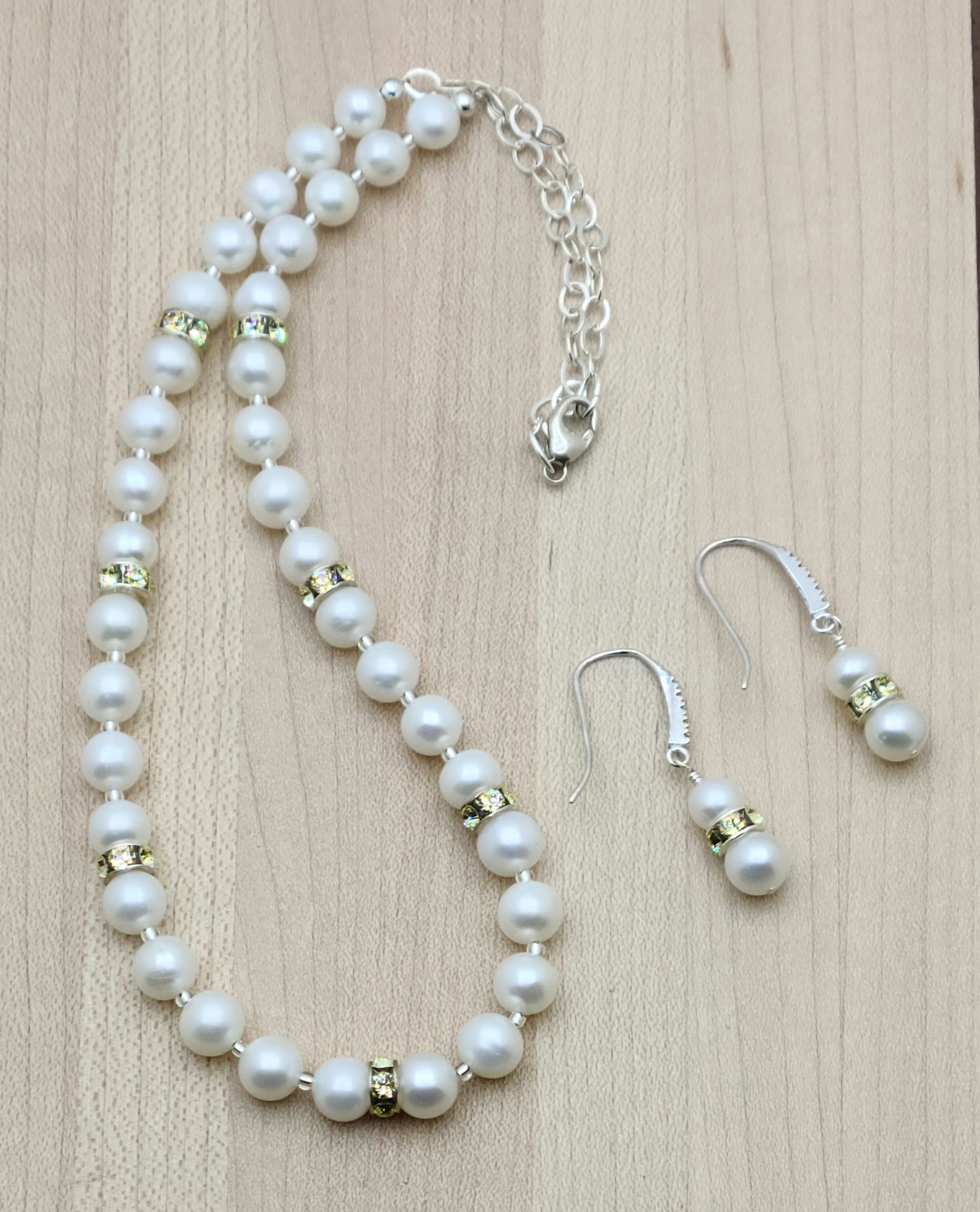 These days, pearls are worn with EVERYTHING and I love that! These lovely near-round freshwater pearls are paired with pale jonquil yellow crystal rondelles and are just gorgeous!