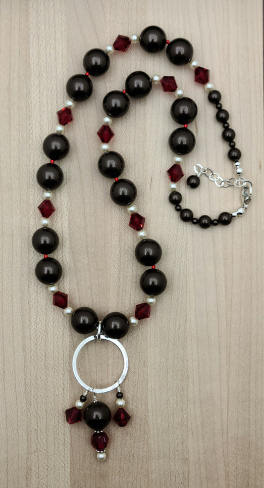 Chocolate, cherries, & cream! You'll have fun wearing these deep chocolate brown crystal pearls and brilliant scarlet crystals surrounded by tiny cream crystal pearls!