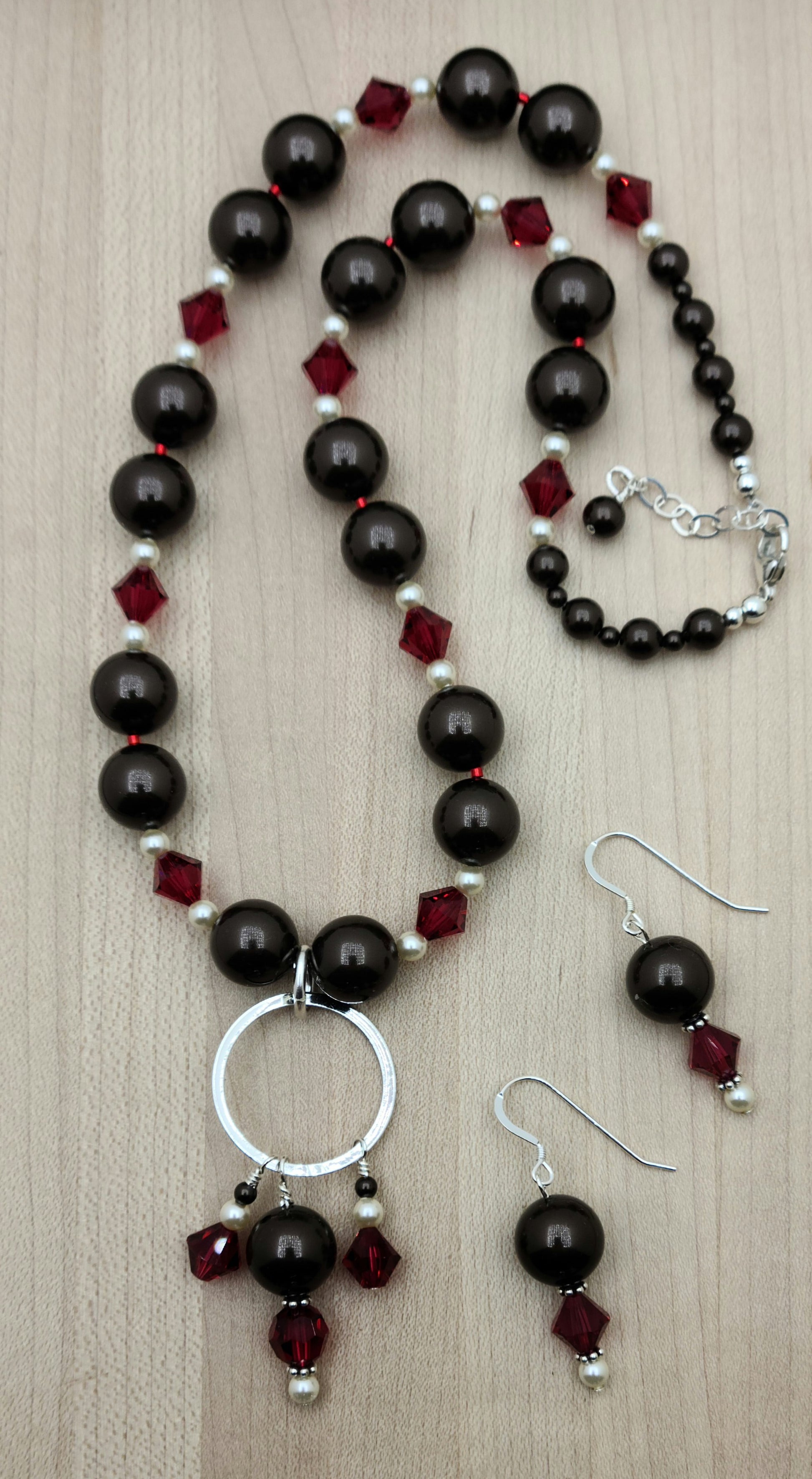 Chocolate, cherries, & cream! You'll have fun wearing these deep chocolate brown crystal pearls and brilliant scarlet crystals surrounded by tiny cream crystal pearls!