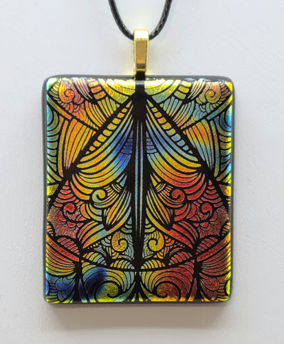 Experience the beauty of a cathedral window with our Cathedral Window Fused Glass Pendant!