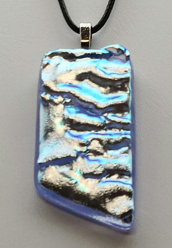 Experience the beauty of a glacier with our Glacial Ice Fused Glass Pendant. 