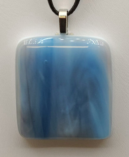 Feel the rush of a waterfall with this stunning blue pendant. 