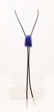 bolo tie of blue & lavender geometric designed dichroic glass with black leather
