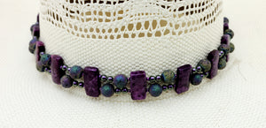 hatband combines deep purple crazy lace agate, iridescent lava stone, crystal pearls, Toho seed beads, sterling silver, & leather! Adjustable with a leather slider knot