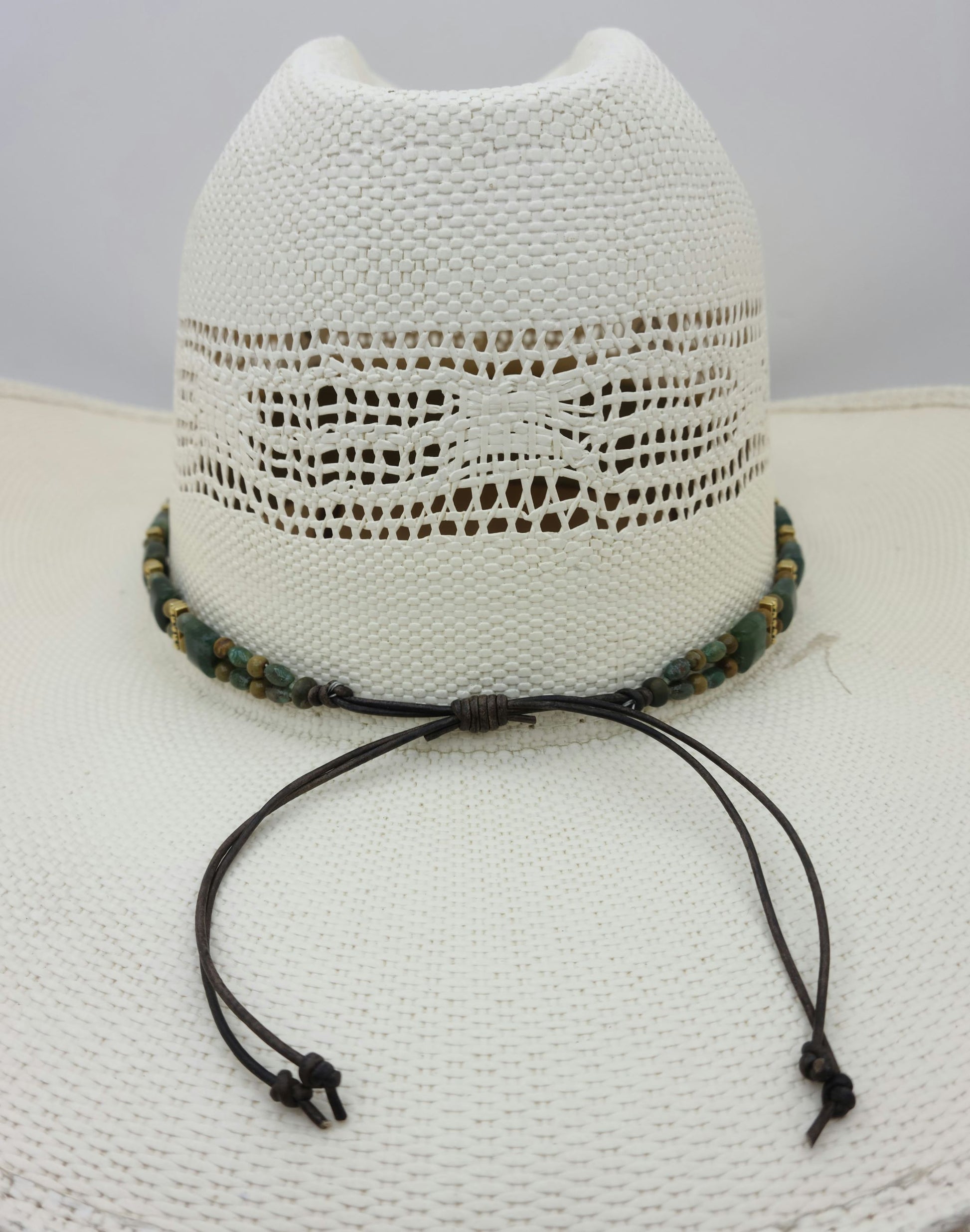 adjustable by leather slider knot