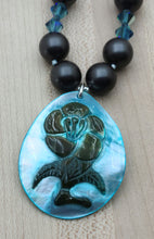 mother of pearl flower carved pendant