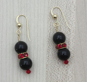 The bold colors of black & red are celebrated in earrings of black crystal pearls & bright red crystal rondelles