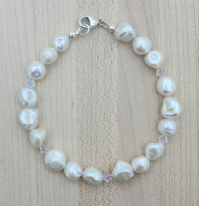 The luster of these keishi pearls is exquisite! The subtle crystals add just the right amount of bling.  These would make wonderful bridal braacelet!