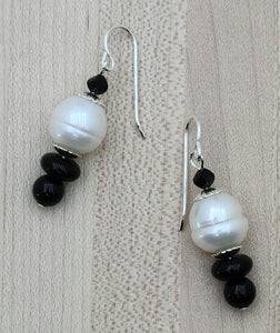 Black onyx & large white baroque freshwater pearls make a stunning contrast in these earrings
