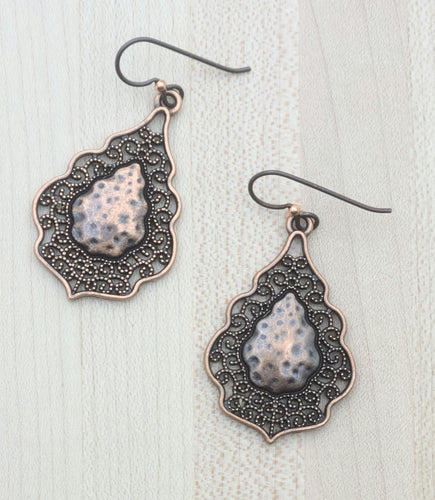 Hammer copper with a lacy edge show off in these copper earrings. Niobium fish hooks (niobium is considered hypo-allergenic