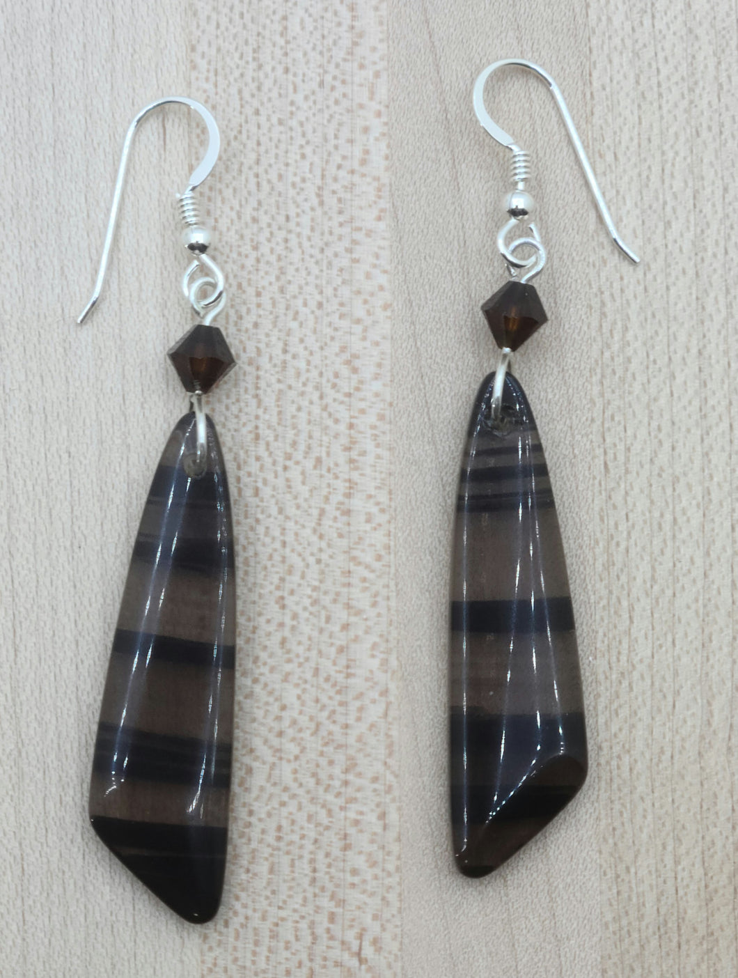 Midnight lace obsidian with translucent light brown with dark cocoa strikes hand from mocca crystals* in these lovely earrings.