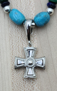 sterling silver cross on turquoise
